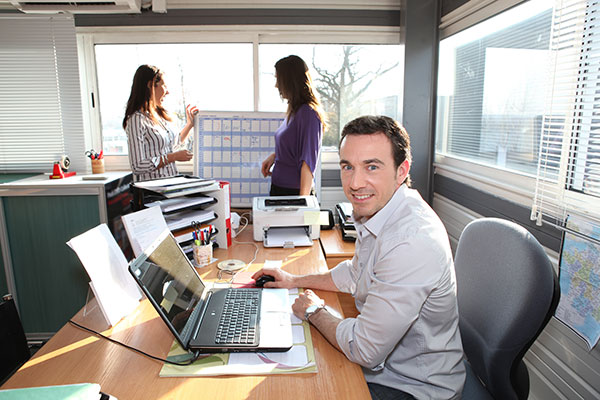 businessman sitting at desk in an office
